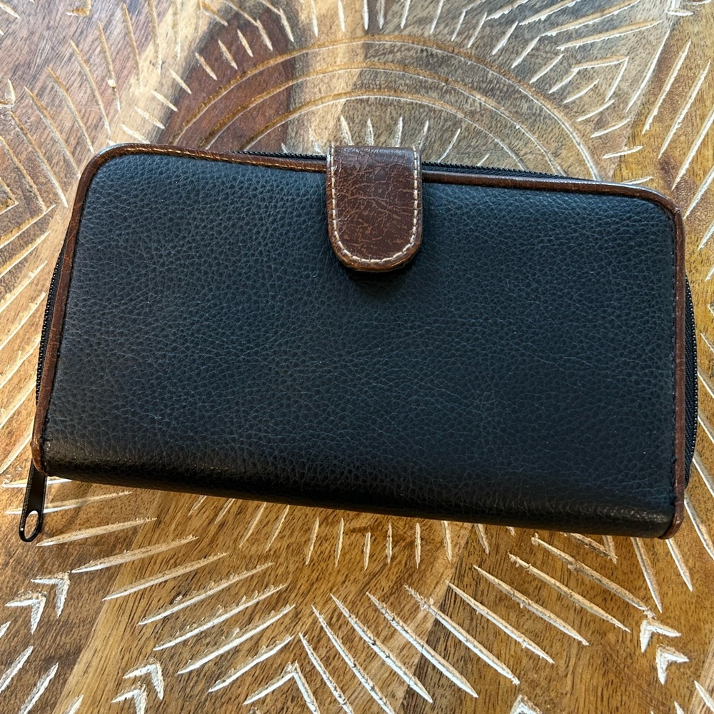 Rosetti woman’s wallet, black with brown trim, pebbled faux leather